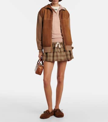 Segelschuhe aus Shearling mit Veloursleder | Miu Miu