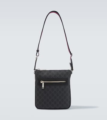 GG canvas leather-trimmed crossbody bag | Gucci