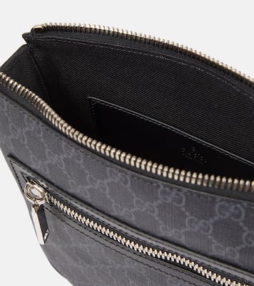 GG canvas leather-trimmed crossbody bag | Gucci