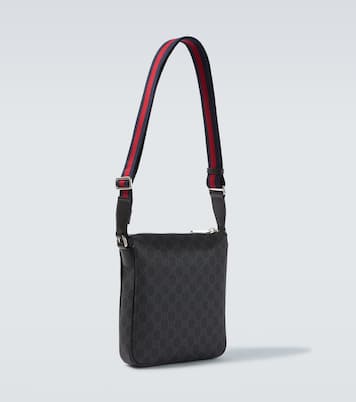 GG canvas leather-trimmed crossbody bag | Gucci