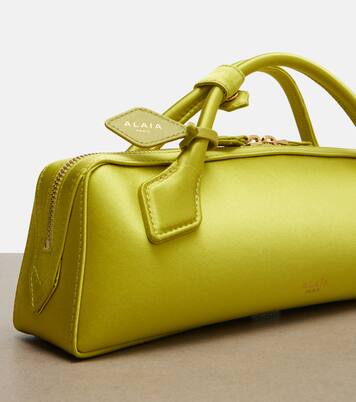 Le Teckel Small satin clutch | Alaïa