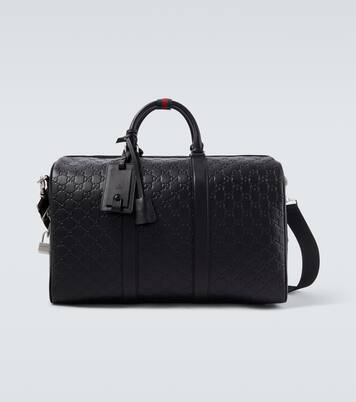 GG Emblem Medium leather duffel bag | Gucci