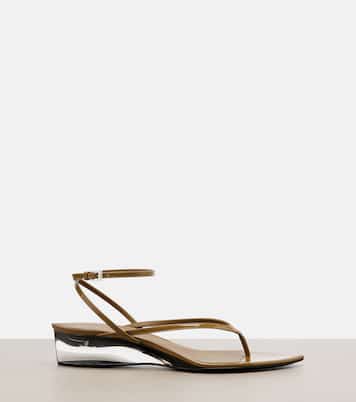 Invisible patent leather wedge thong sandals | Alaïa