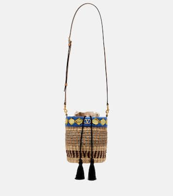 VLogo Small embellished raffia-effect bucket bag | Valentino Garavani