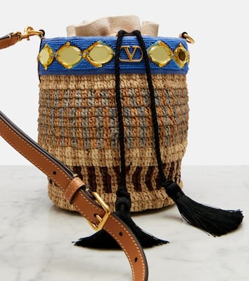 VLogo Small embellished raffia-effect bucket bag | Valentino Garavani