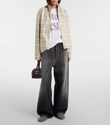 جينز بأرجل عريضة بتأثير مهترئ  2023 | Acne Studios