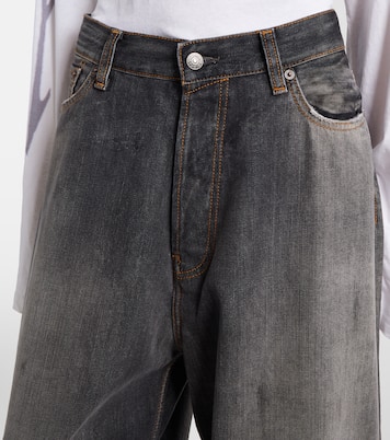 جينز بأرجل عريضة بتأثير مهترئ  2023 | Acne Studios