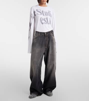 جينز بأرجل عريضة بتأثير مهترئ  2023 | Acne Studios