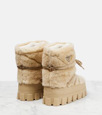 Shearling and leather snow boots | Prada