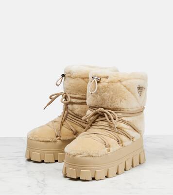Shearling and leather snow boots | Prada