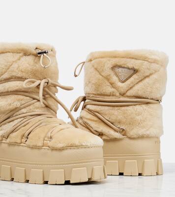 Shearling and leather snow boots | Prada