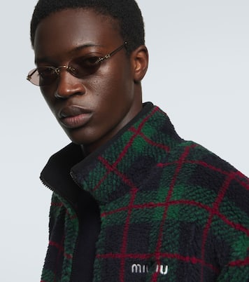 Logo oval sunglasses | Miu Miu