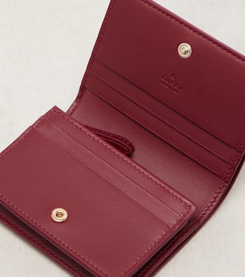 GG Emblem patent leather wallet | Gucci