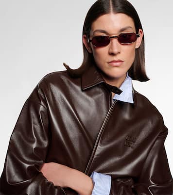 Occhiali da sole ovali con logo | Miu Miu