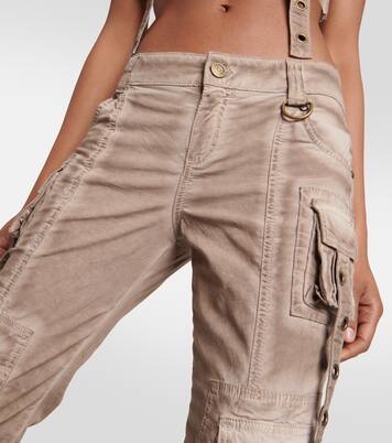 Jeans flared de tiro bajo con adornos | Blumarine