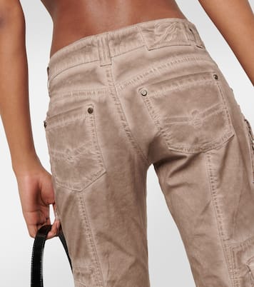 Jeans flared de tiro bajo con adornos | Blumarine