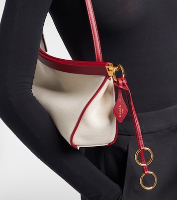 Le Click Medium canvas shoulder bag | Alaïa