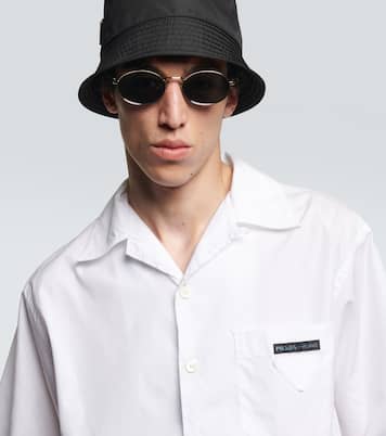 Lunettes de soleil ovales à logo | Prada