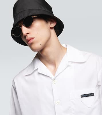 Lunettes de soleil ovales à logo | Prada