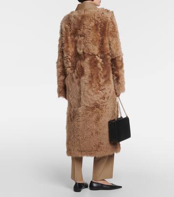 Leather-trimmed shearling coat | Toteme