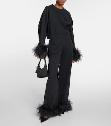 Pantalones deportivos de algodón con plumas | Prada