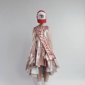 Metallic bow-detailed dress | Caroline Bosmans