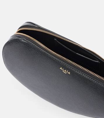 Le Demi Cœur leather clutch | Alaïa