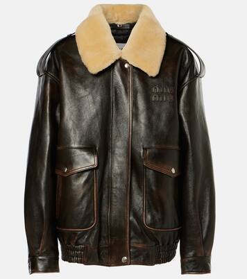 Veste en cuir et shearling à logo | Miu Miu