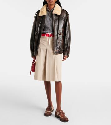 Veste en cuir et shearling à logo | Miu Miu
