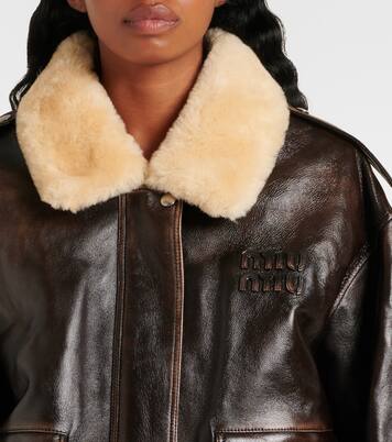 Veste en cuir et shearling à logo | Miu Miu