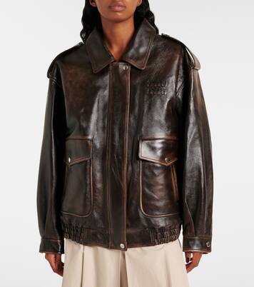 Veste en cuir et shearling à logo | Miu Miu