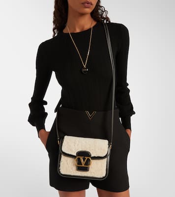 9TO5 shearling and leather shoulder bag | Valentino Garavani