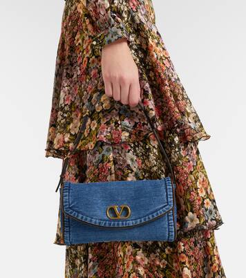 Devain Small denim shoulder bag | Valentino Garavani