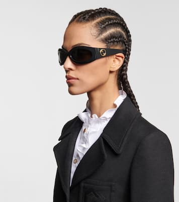Occhiali da sole ovali | Gucci
