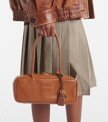 Beau logo embossed leather tote bag | Miu Miu