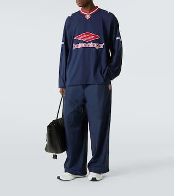 Logo oversized cotton-blend jersey track pants | Balenciaga