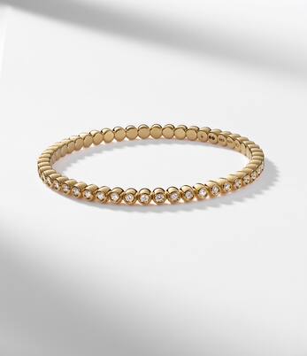 Stretchy 18kt gold bracelet with diamonds | Bucherer Fine Jewellery