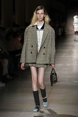 Mini-jupe en laine vierge à carreaux | Miu Miu