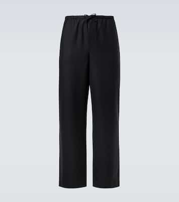 Xon virgin wool wide-leg pants in black - The Row | Mytheresa