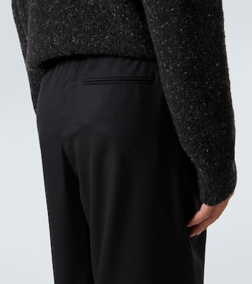 Xon virgin wool wide-leg pants in black - The Row | Mytheresa