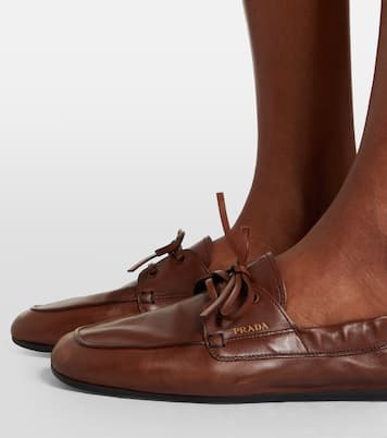 Shuffle leather boat shoes | Prada
