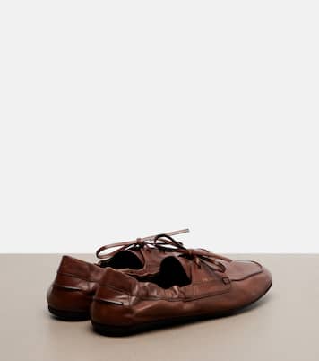 Shuffle leather boat shoes | Prada