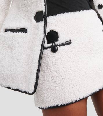 Minirock aus Shearling mit Leder | Blancha