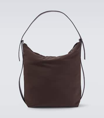 Airport leather-trimmed tote bag | Studio Nicholson