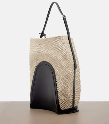 Hip Large leather-trimmed bucket bag | Alaïa