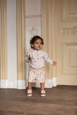 Baby Bouches cotton-blend bodysuit | Donsje