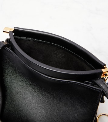 Le Click Small leather shoulder bag | Alaïa