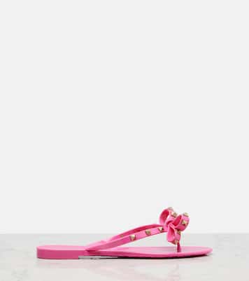 Rockstud bow-detail thong sandals | Valentino Garavani