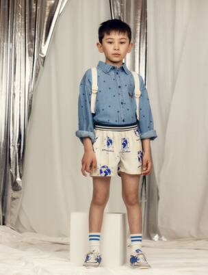 Society printed wide-leg pants | Mini Rodini