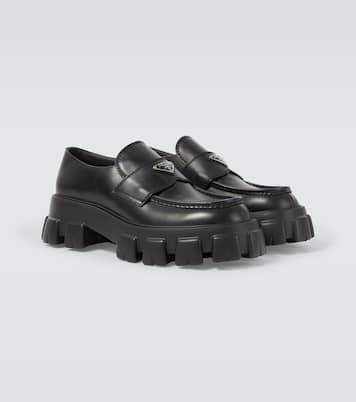 Logo leather platform loafers | Prada